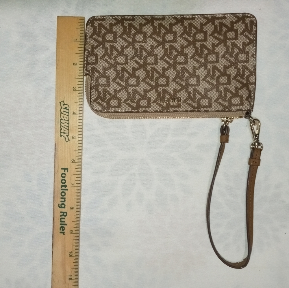 Small brown/tan Vela DKNY wristlet